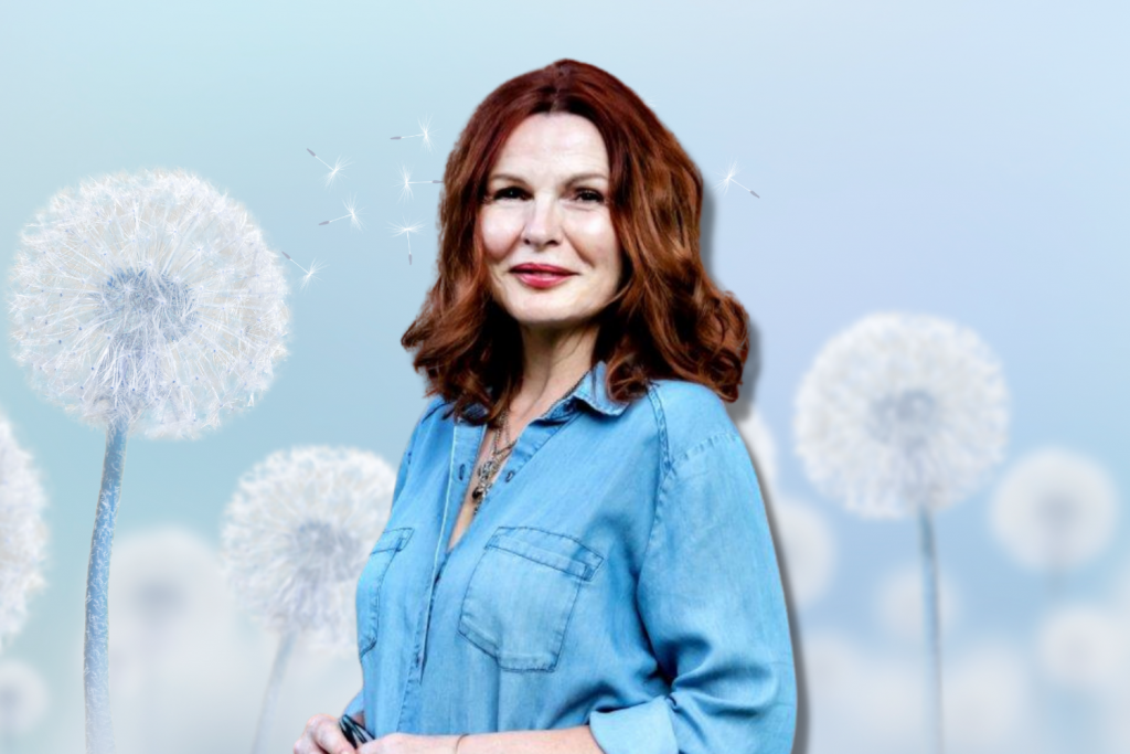 Dunya in front of a dandelion field